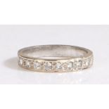 A platinum diamond set half eternity ring. Approx. total diamond carat weight: 0.27cts. Colour: G-H.