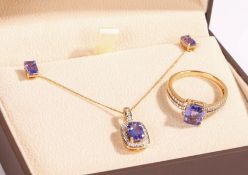 A pair of 14ct yellow gold tanzanite stud earrings. Carat weight: 1.23cts. Weighing 1.28 grams. A