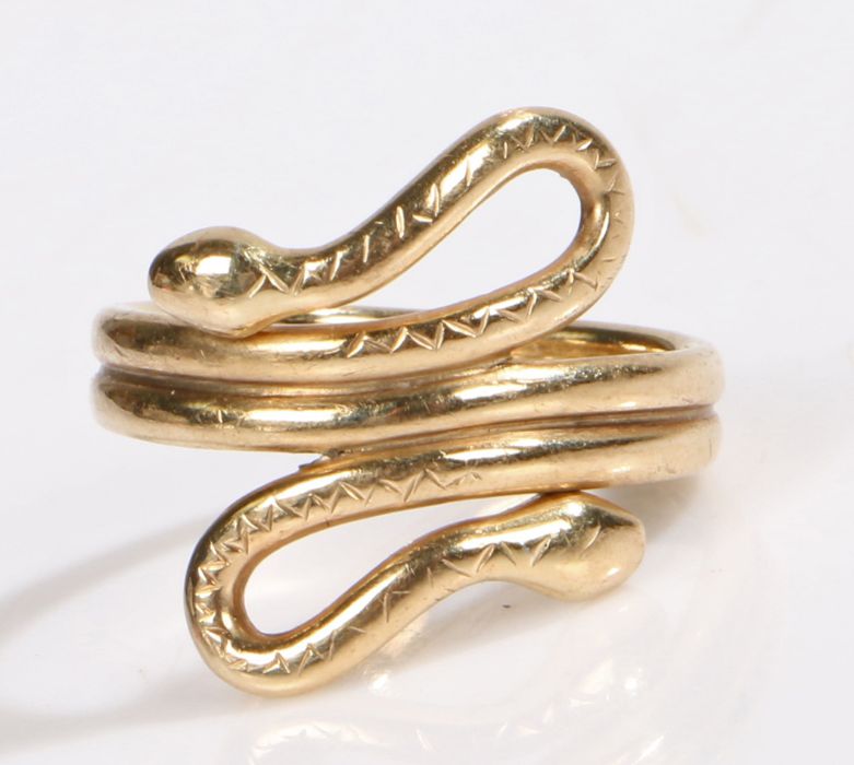 A 9ct yellow gold snake ring with two heads. Ring size Q. Weighing 5.40 grams. Used, in very good