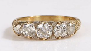 An 18ct yellow gold Victorian style diamond ring with five diamonds. Central diamond approx. carat