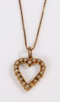 A 9ct gold pearl set heart outlined pendant suspended from a 9ct gold box chain. Measurements of