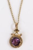 A yellow metal pendant with a round cut amethyst surrounded by round pearls, suspended from a yellow