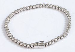 An 18ct gold diamond set bracelet. Total approx. diamond carat weight: 2.75cts. Colour: I-J.