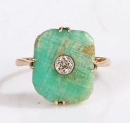 A 9ct yellow gold art deco rectangular jade ring with a solitaire diamond. Approx. measurements of