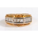 An 18ct gold ring set with nine princess cut diamonds.  Total approx. diamond carat weight 1.