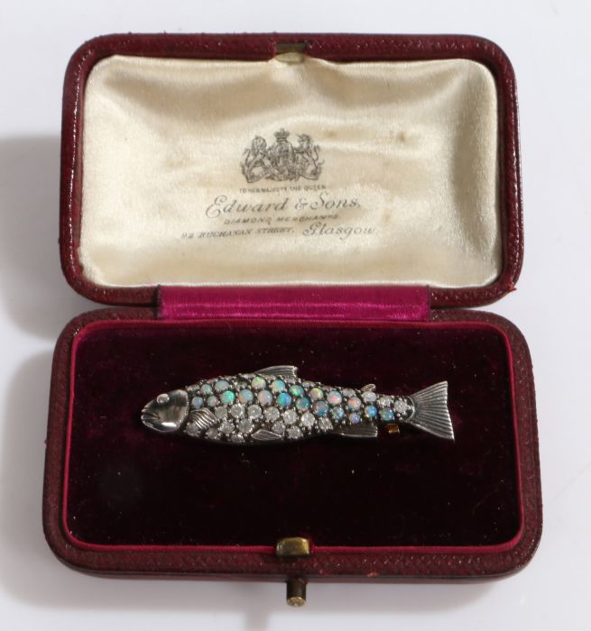 An Edwardian diamond and opal rainbow trout brooch The body has two rows of diamonds and two rows of