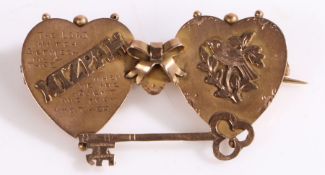 A 9ct yellow gold double heart Mizpah brooch. Measurements: 44 x 23mm. Weighing 2.80 grams. Used, in