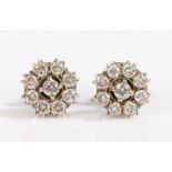 A pair of white Indian metal diamond cluster earrings. Approx. total diamond carat weight: 2.