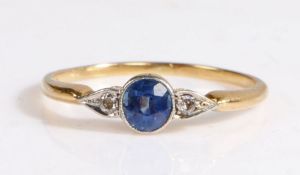 An 18ct yellow gold sapphire and diamond trilogy ring. Approx. sapphire carat weight: 0.65cts.