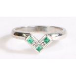 An 18ct white gold 'V' ring with emeralds and diamonds. Approx. total emerald carat weight: 0.21cts.