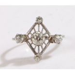 An art deco platinum and diamond five stone ring. Total approx. diamond carat weight 1.20cts.