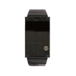 Sinclair "The Black Watch" gentleman's digital wristwatch, the black rectangular case on a black