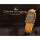 Jaeger-Le-Coultre 18 carat gold gentleman's wristwatch, the signed grey dial with baton markers, the