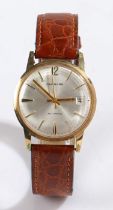 Garrard 9 carat gold gentleman's wristwatch, the signed silver dial with baton markers, Arabic 12
