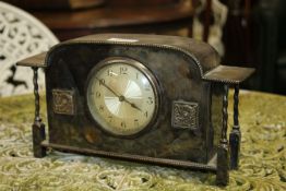 Early to mid 20th century silver plated mantle clock the white dial with Arabic numerals, 30cm