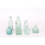 Collection of apothecary style bottles and vials of various designs, largest being 12cm high (7)