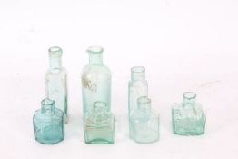 Collection of apothecary style bottles and vials of various designs, largest being 12cm high (7)