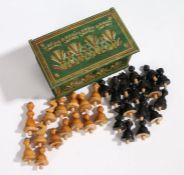 Turned wooden chess set, possibly Polish, the pieces with dowels to the bases, housed in a wooden