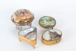 Four brass and porcelain painted boxes of various shaped depicting scenes, (4)