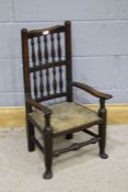 19th Century stick back child's chair, with turned sticks and a rush seat