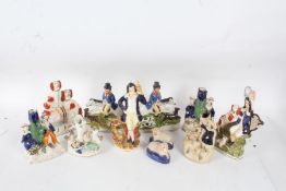 Collection of Staffordshire figure groups, to include a pair of hunting scenes, spaniels etc (11)