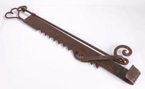 19th Century chimney crane, the love heart loop to the top above the ratchet and hook, 90cm long