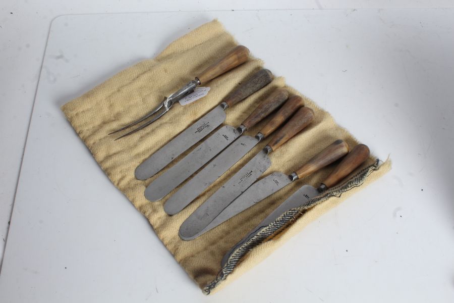 Set of six horn handled and Sheffield steel bladed knives, and a carving fork similar (7)