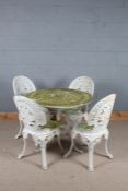 Aluminium garden table and chairs painted in white the chairs and table with pierced foliate