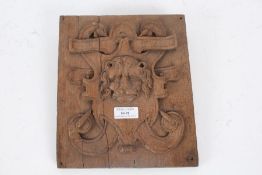 An 19th Century carved oak panel, the square panel designed with a lions head to the centre with a