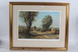 Alan Fearnley Signed Limited Edition print depicting haymaking housed within a gilt frame, 78cm by