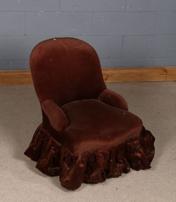 Victorian nursing chair, with brown upholstery and raised on turned legs and castors, 59cm wide