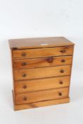 20th century pine specimen cabinet with a rectangular top going down to five graduated drawers, 43cm
