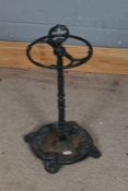 Cast iron stick stand, with two divisions and loop carrying handle, 56 cm tall approx.