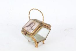 Palais Royale style casket of pentagonal prism form brass bound with a brass carrying handle and