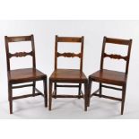 Three 19th Century mahogany country dining chairs, having shaped back rests, rail side supports