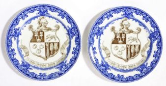 Pair of Doulton Armorial porcelain plates, each with a crest and motto, 24.5cm wide, (2)