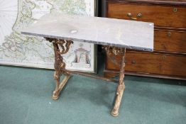 Late 19th/ early 20th century cast iron table with a grey veined marble top, the frame with