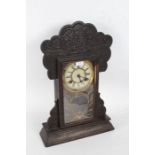 Late 19th/ Early 20th century American mantle clock made by Waterbury Clock Co USA, having a press