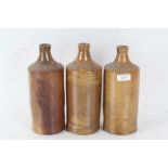 Three Victorian stoneware vessels all with a brown glaze, 26cm high