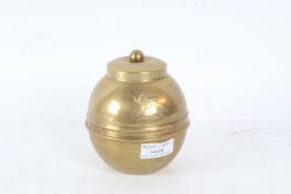 George V British Empire Exhibition 1924 brass tea caddy of orb form made by Liptons, 13cm high