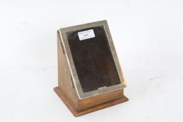 Oak box with a single door with a silver picture frame hallmarked for Birmingham dated 1946, 15cm