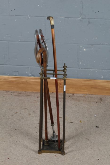 20th century brass stick stand together with two walking sticks and a shooting stick (4)