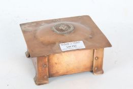 20th century copper cigarette box of rectangular form with foliate decoration to the top and