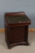 20th century mahogany davenport desk, with a green tooled leather inset top and four draws to the