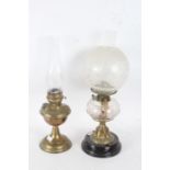 Two oil lamps, Duplex with a clear glass chimney and a frosted shade and a clear reservoir