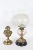 Two oil lamps, Duplex with a clear glass chimney and a frosted shade and a clear reservoir