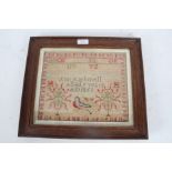 19th century needle work sampler, by Ann Rathmell 9 years old 1851, decorated with the alphabet