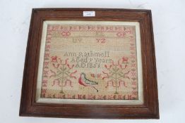 19th century needle work sampler, by Ann Rathmell 9 years old 1851, decorated with the alphabet