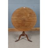 19th century oak occasional tilt top table, with a turned column and cabriole legs, 78cm wide 70cm