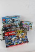 Five boxes of Lego, Ninjago Masters of Spinjitzu 70734, Lego City 60138, Minecraft 21118, Friends